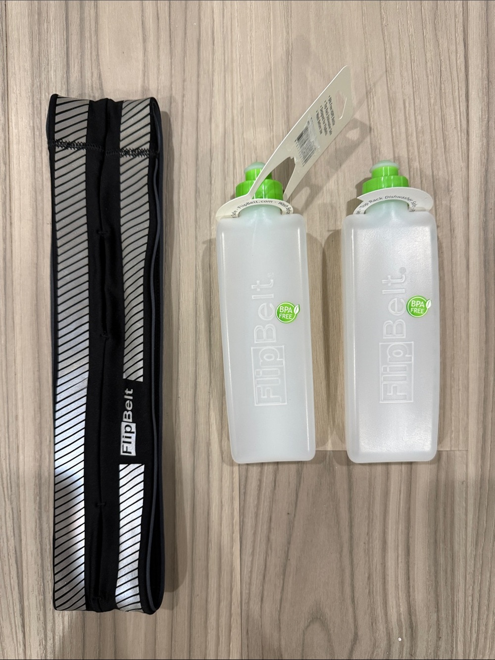 FlipBelt Black Reflective Running Waist Pack with Two bottles